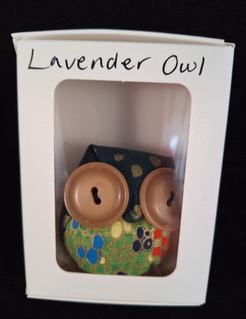 Aberlady Lavender Owl (Light brown eyes, head dark green with gold squares, body gold background with blue, green, yellow, red)